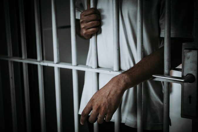 Hands of men desperate to catch the iron prisonprisoner conceptthailand peopleHope to be free